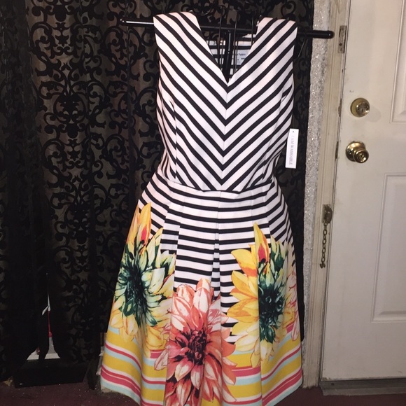 Black ,white with multi colored flowers on dress