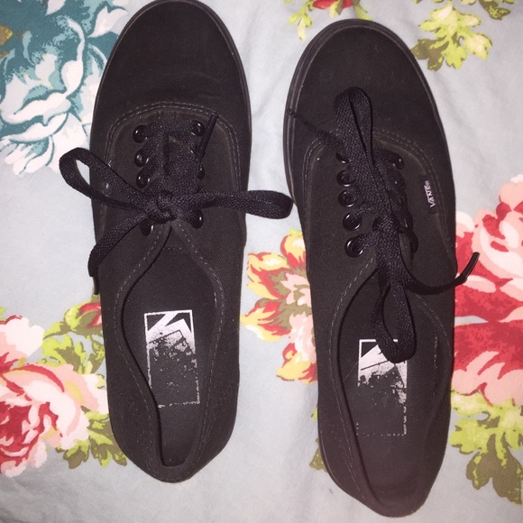 Black low profile Vans. Hardly worn.