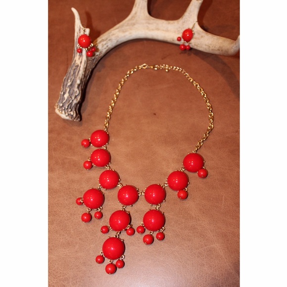 Red statement necklace and earrings