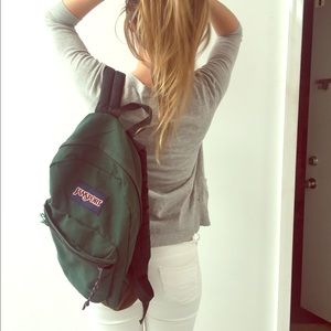 Vintage hunter green Jansport with leather bottom!