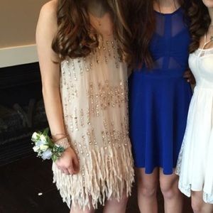 Sequin fringe beige dress.