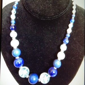 Necklace in blue and white stones