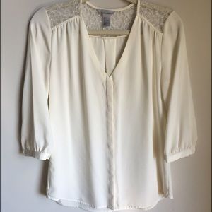 Beige loose fitting blouse with lace accent