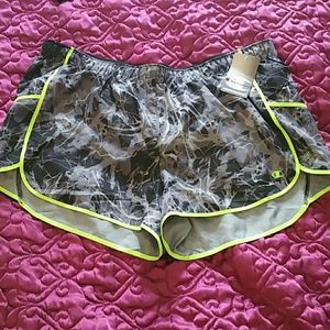 Grey and lime green track shorts