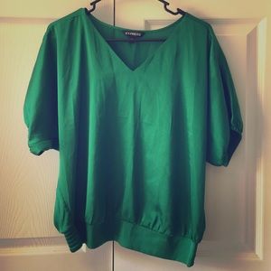 Satiny green top.