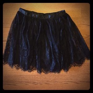 Cute black lace mini skirt.