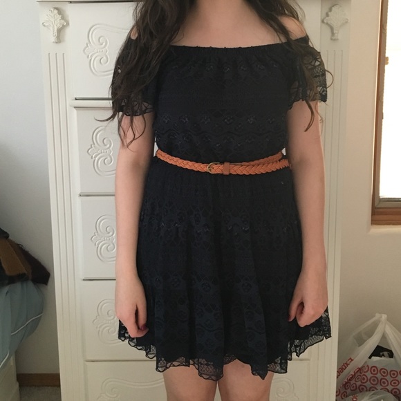 Lace off the shoulder navy dress.