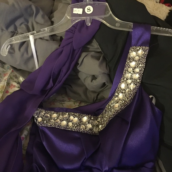Purple knee length fitted formal dress