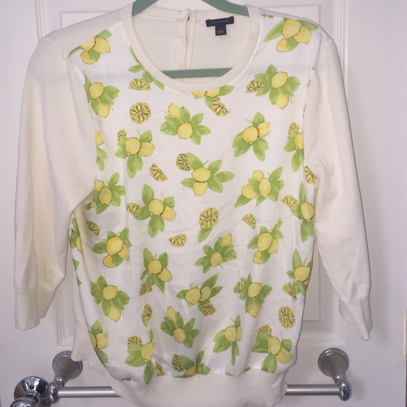 Cute lemon sweater! Never worn. Great for spring!