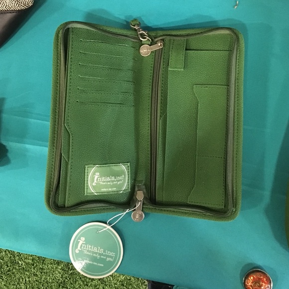 Initials Inc green clutch