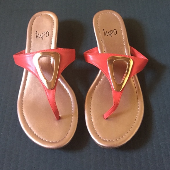 Sandals with slight wedge, worn twice.