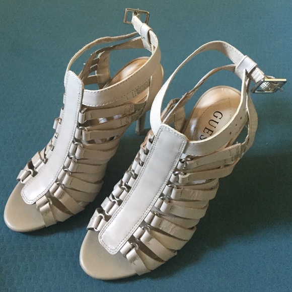 Guess heels, 4" heel, strappy, partly leather.