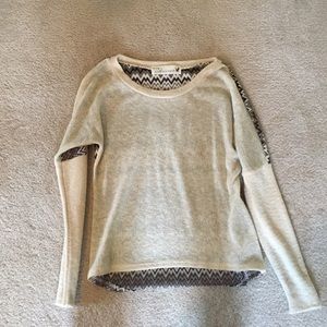 Cream sweater with patterned back