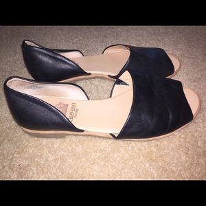 Leather open-toe flats.