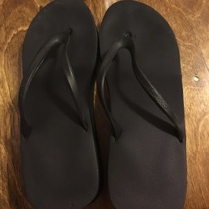 Black flip flops