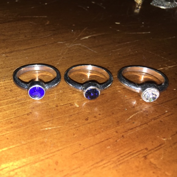 blue, dark blue, and silver rings