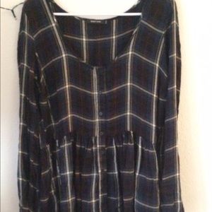 This is a casual plaid dress, size medium