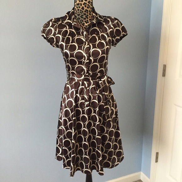 Beautiful, classy button down satin dress.