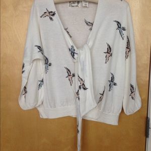 Cotton sweater with coordinating tee.