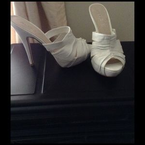 Aldo white leather heels.