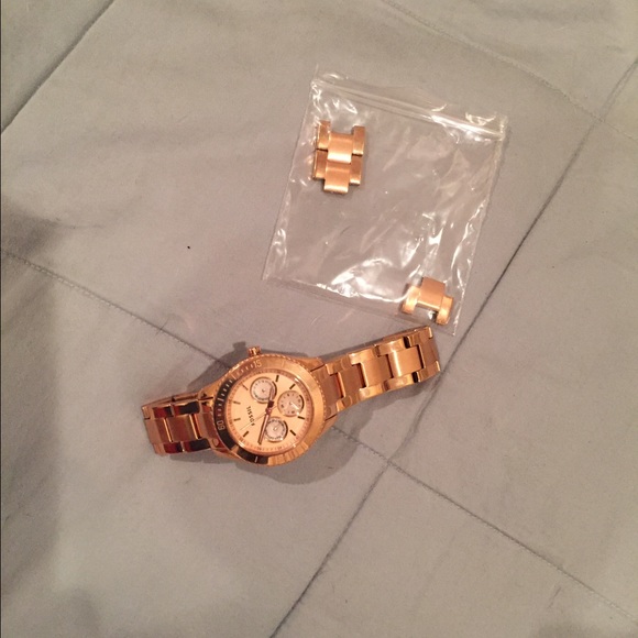 Rose gold fossil watch only worn twice.