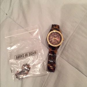 Tortoise shell fossil watch like new
