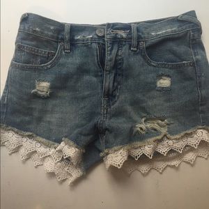 New Free People lace trim distressed jean shorts