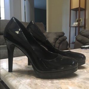Black patent leather pumps