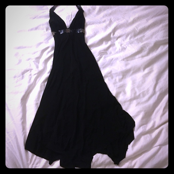 Black dress with beaded detailing.