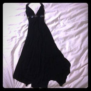 Black dress with beaded detailing.