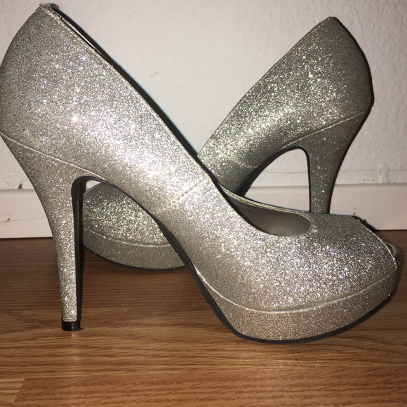 Silver sparkly platform heels.