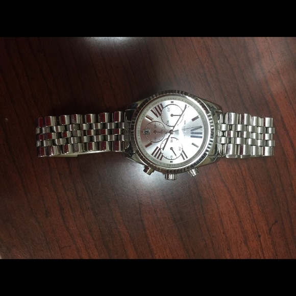Michael Kors, Fossil, and Invicta watches.