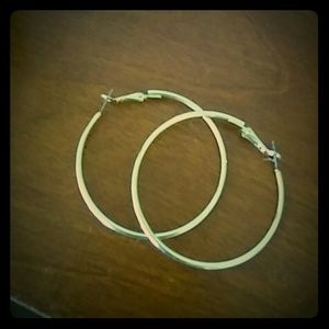 Large gold loop earrings