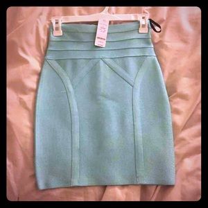 Mint green Bebe body con skirt