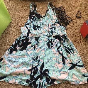 Tropical printed romper never got to wear it.