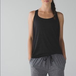 Lululemon black wild tank with gold/bronze stripes