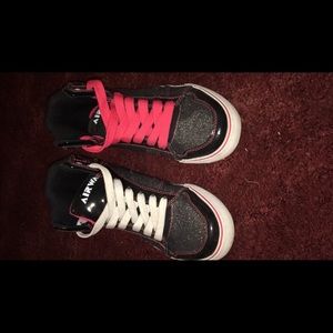 Air walk Shoes with different colored laces.