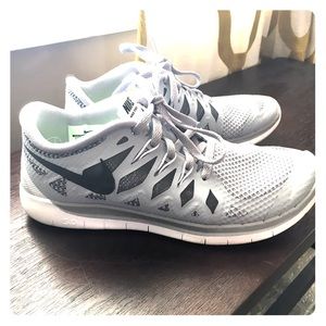 Light gray Nike shoes wore once.