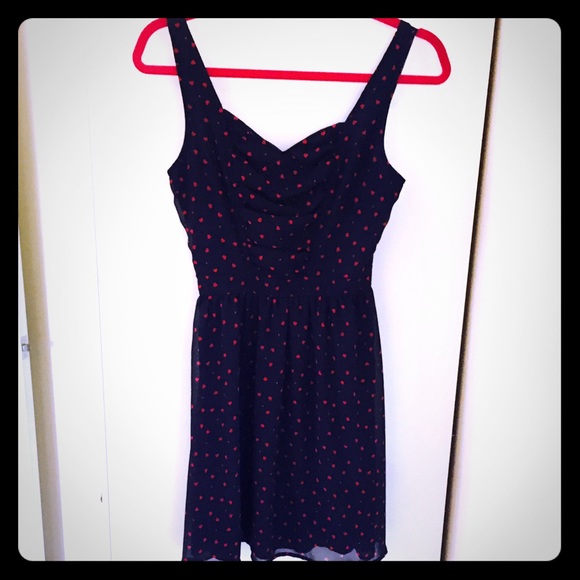 Navy dress with red hearts.
