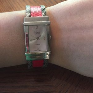 Watch with faux red leather detail