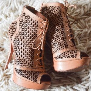Schutz laser cut lace up booties