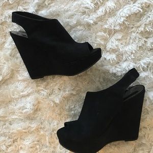 Carlos Santana black wedges