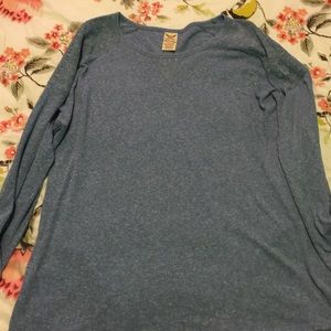 L juniors. Light blue top.