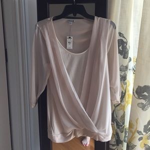 Pretty sheer cream blouse. Sheer sleeves.