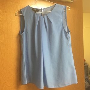 Blue sleeveless blouse