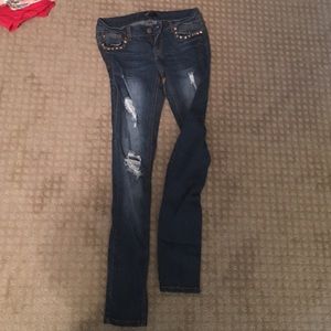 Ripped studded skinny jeans