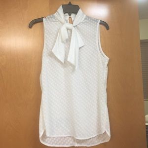White sleeveless blouse