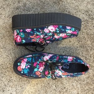 Floral print platform creepers.