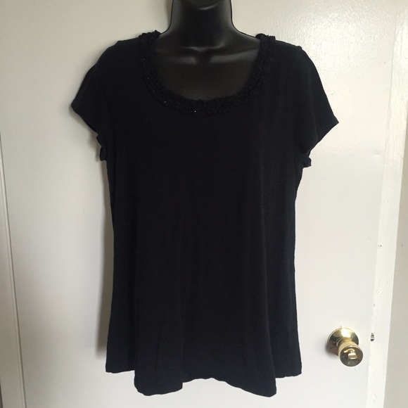 Large black top with detail in the neck line