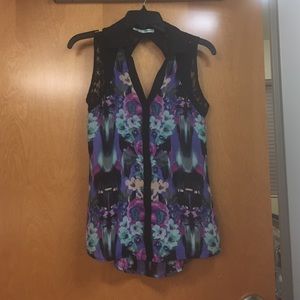Sleeveless floral button up blouse